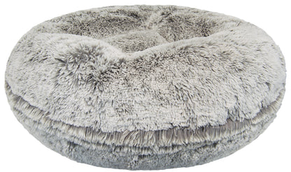 Plush gray round dog bed with soft faux fur exterior shown without a dog